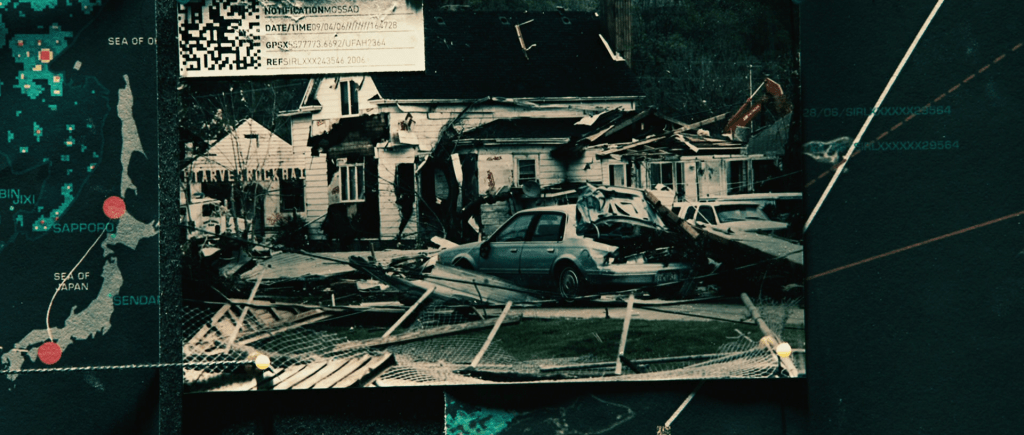 Photo of smashed house dated 2006.