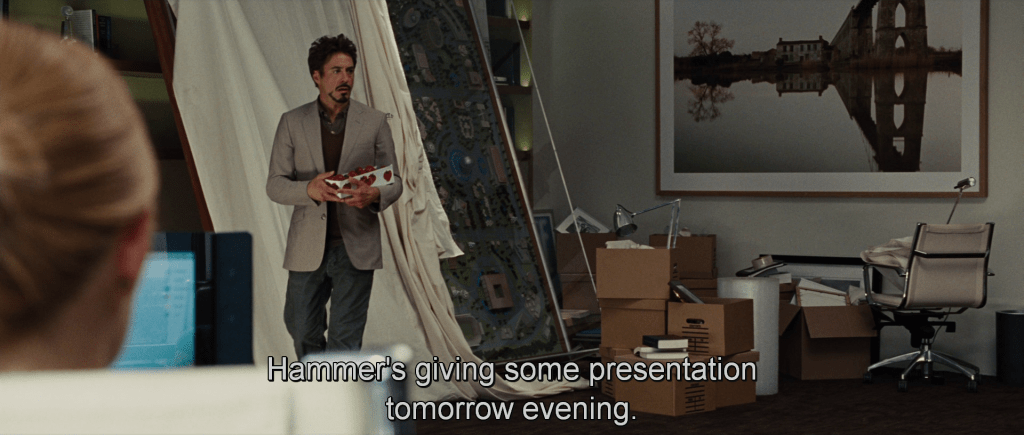 Pepper Potts talking about Justin Hammer giving a presentation at the Stark Expo tomorrow evening.