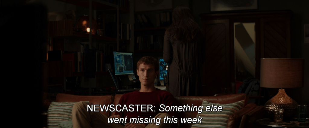 Newscaster narrates from the television,