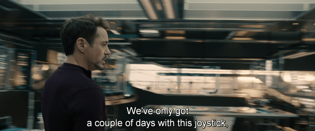 Tony in the lab at Avengers Tower talking to Bruce Banner, 