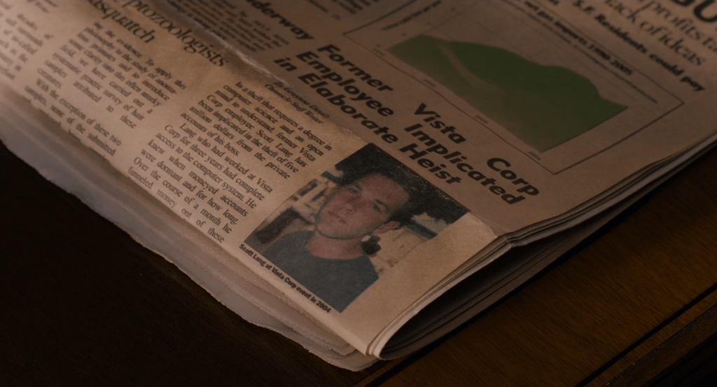 Newspaper story on Scott's Vista Corp heist. Photo of Scott is dated 2004.