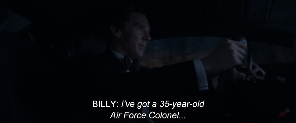 Strange is in his car listening to Billy on the phone. 