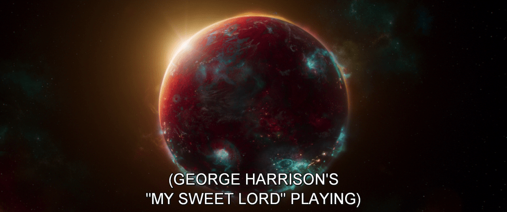 Establishing shot of Ego's planet. Subtitles read, 
