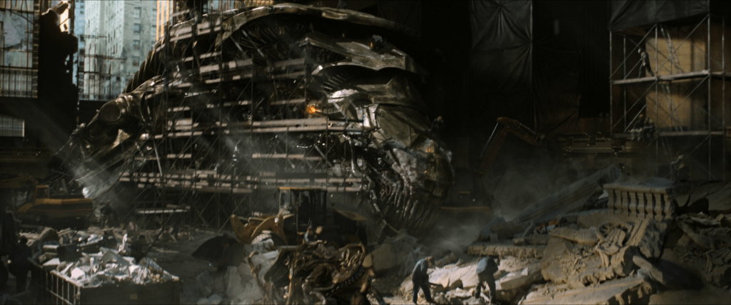 Clean up crews working around the corpse of a Chitauri Leviathan in Grand Central Terminal.