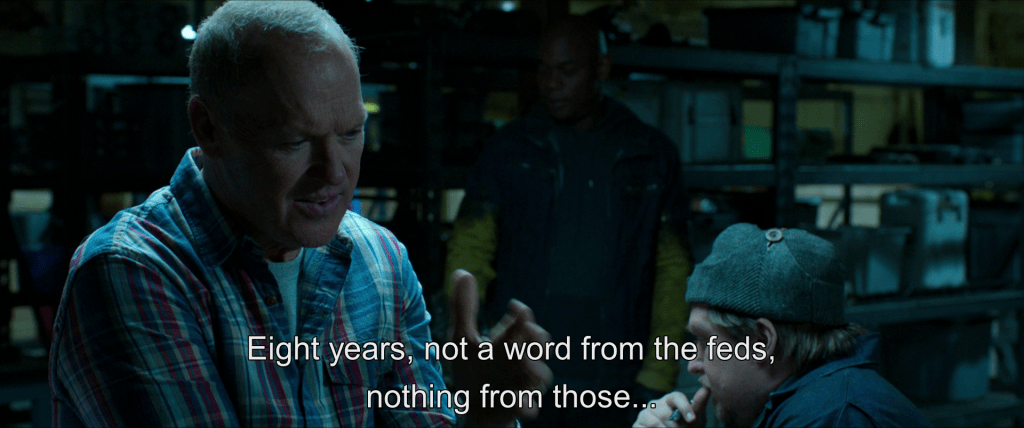 Toomes talks to his partners in his workshop.