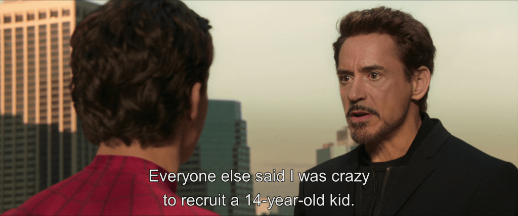 Tony confronts Peter on the roof of a building.