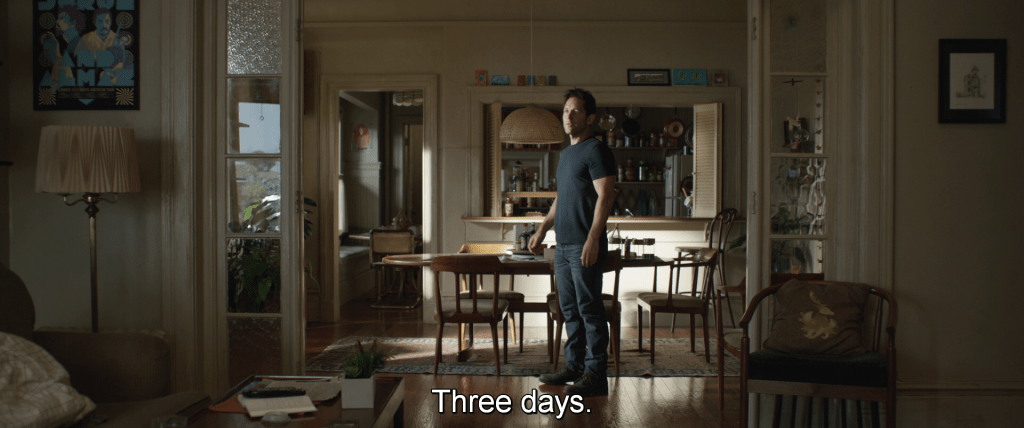 Scott stands alone in his house and says to himself,