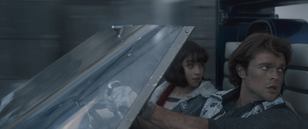 Emilia Clarke and Alden Ehrenreich in 